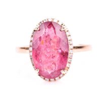 Ring with pink tourmaline cabochon and diamonds