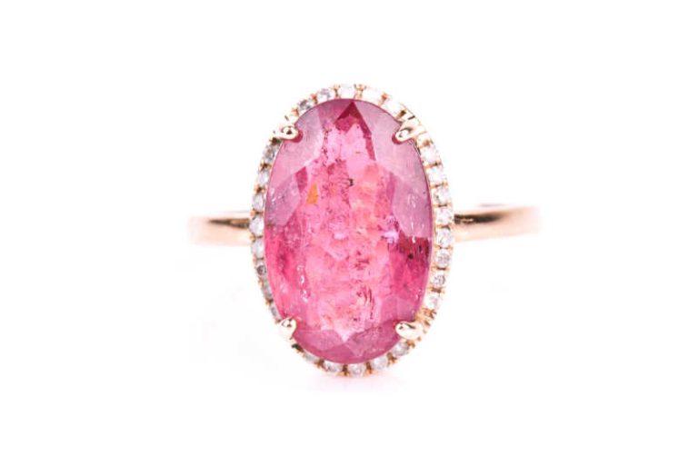 Ring with pink tourmaline cabochon and diamonds