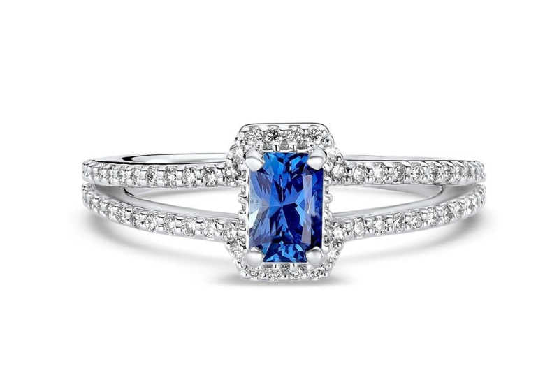 Emerald cut sapphire diamond promise ring