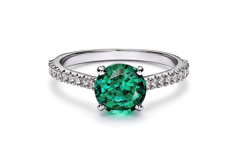 Round cut emerald ring