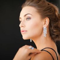 Woman wearing diamond earrings