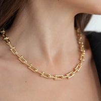 Woman wearing necklace chain