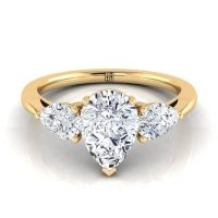 Pear shaped 3 diamonds engagement ring