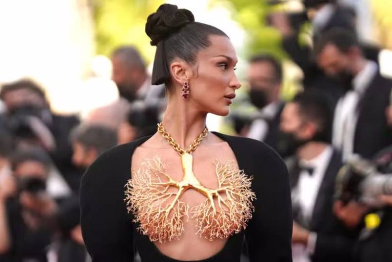 Bella Hadid wearing a Tree of Life pendant